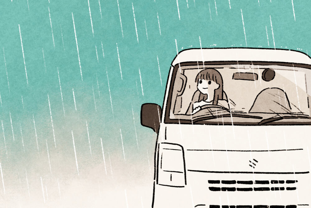 雨の中クルマを運転する、いとうみゆきさん