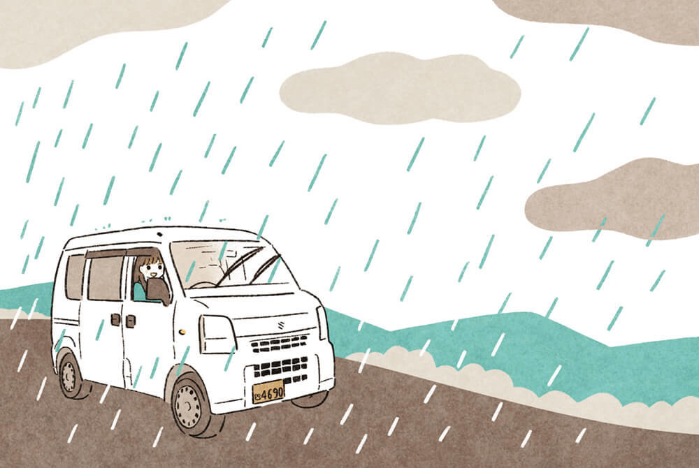 雨のなかクルマを運転する、いとうみゆきさん