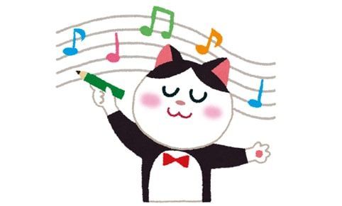 楽しそうな猫と譜面のイラスト
