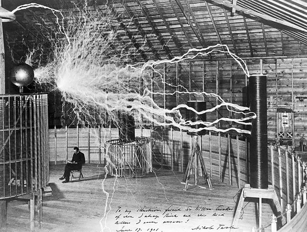 Nikola Tesla, with his equipment Wellcome Library, London CC BY 4.0