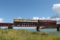 『京都新聞写真コンテスト 由良川橋梁を疾走する丹後あかまつ号その
