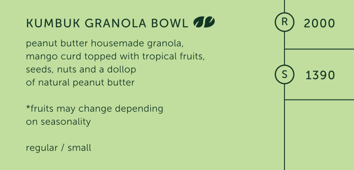 KUMBUK GRANOLA BOWL  peanut butter housemade granola,  mango curd topped with tropical fruits,  seeds, nuts and a dollop  of natural peanut butter  *fruits may change depending  on seasonality  regular R 2000  small S 1390.png