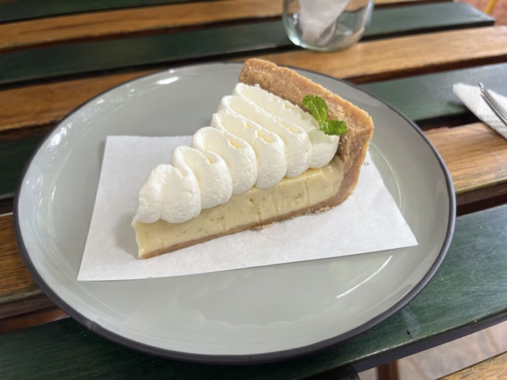 KEY LIME SLICE Biscuit base, creamy lime center, whipped  cream topping. This is the dessert that put  us on the map