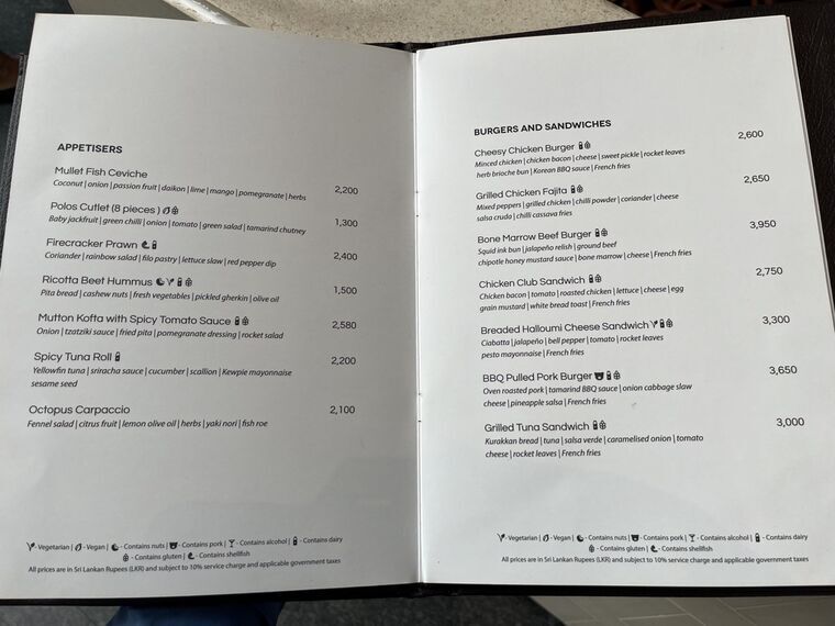 57のメニューのAPPETISERSとBURGERS AND SANDWICHESの見開きページ。Polos Cutlet 1,300、Bone Marrow Beef Burger 3,950などの価格が並ぶ