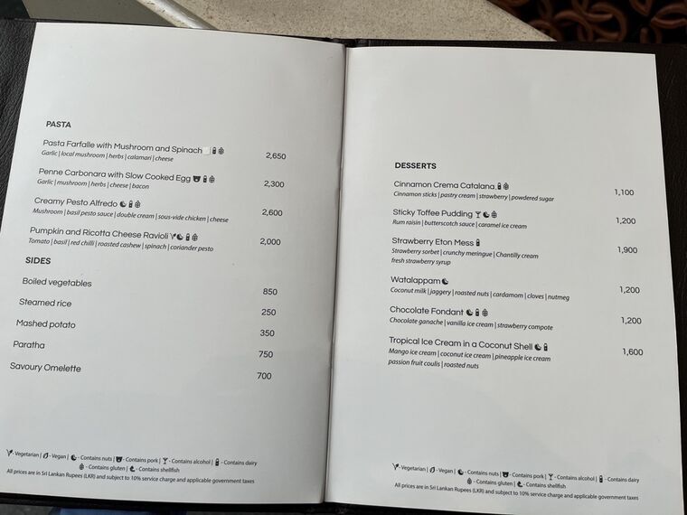 57のメニューのPASTA、SIDES、DESSERTSの見開きページ。Steamed rice 250、Strawberry Eton Mess 1,900などの価格が並ぶ