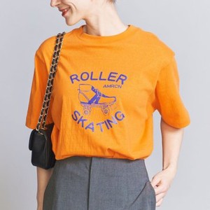 オレンジのロゴTシャツ