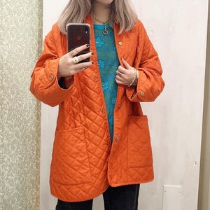 オレンジのキルティングジャケット