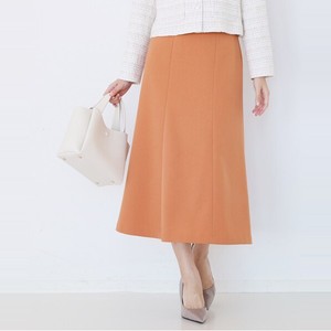 オレンジのスカート