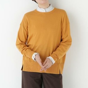 オレンジのニット