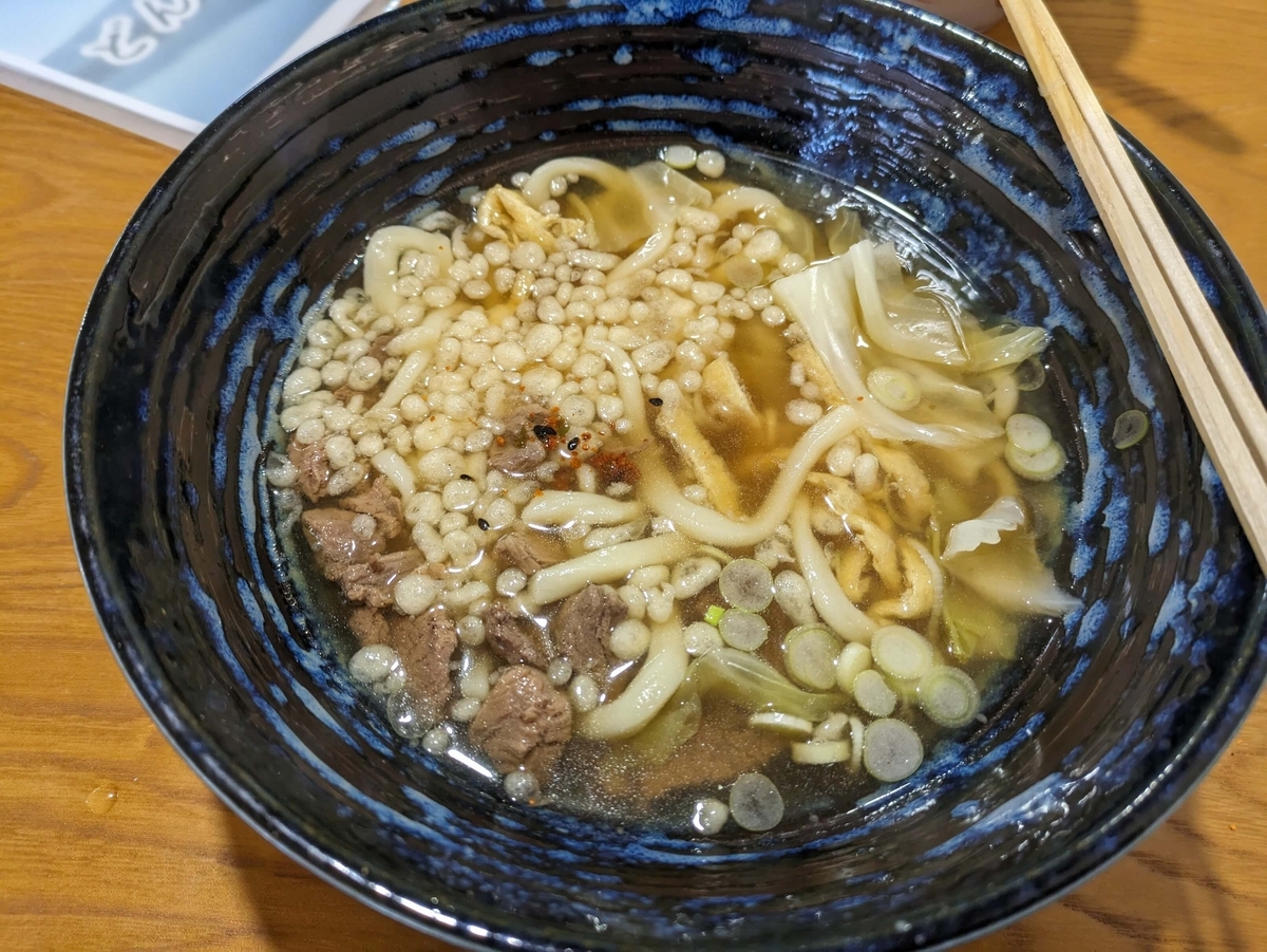 すりだねを投入した肉うどん
