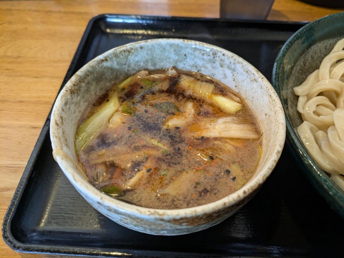 七味唐辛子を投入したつけ汁