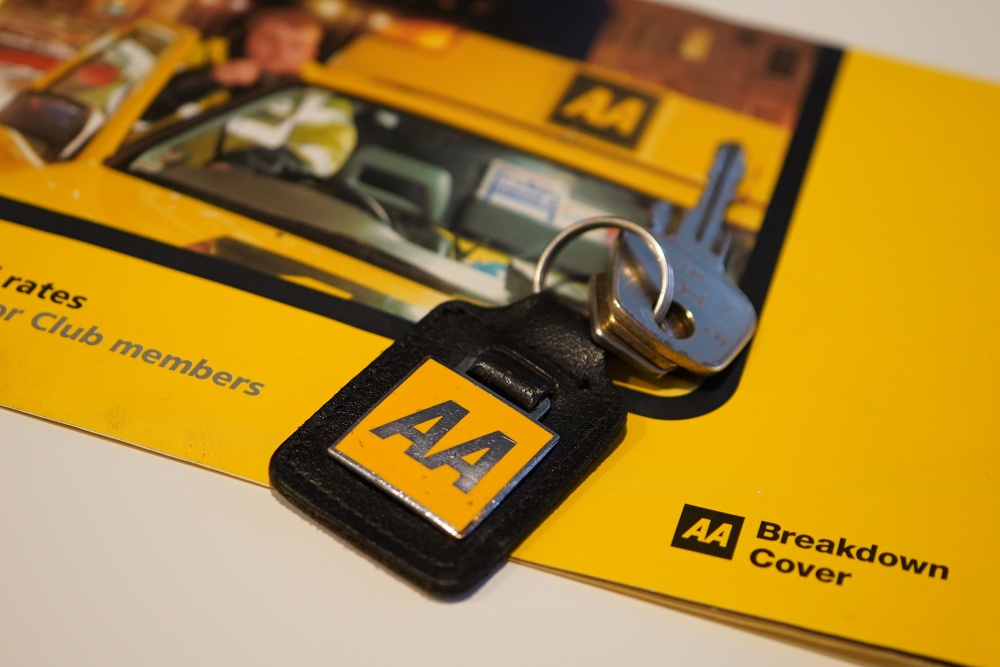 Vintage AA keychain with inscription return to any AA office or patrol