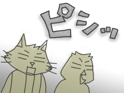 固まった猫とひよこのイラスト
