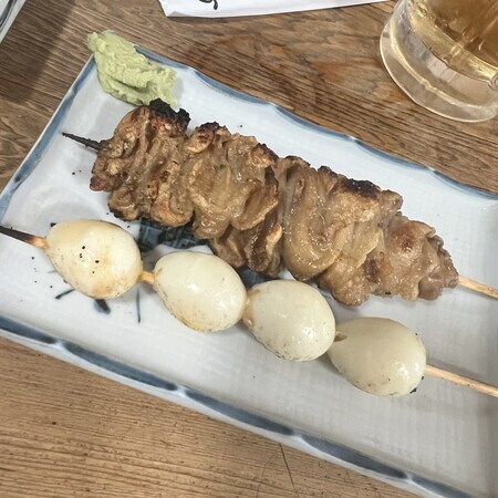 Last, grilled skin and quail eggs.