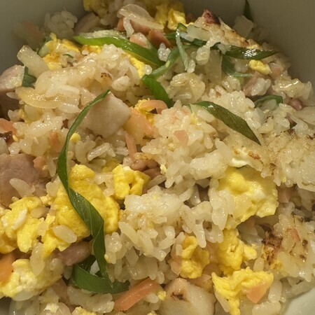 Rice that is whiter than usual, with a fluffy texture, and simple ingredients.