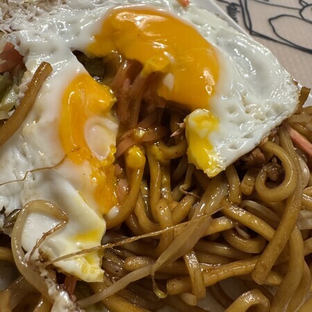 The runny yolk blends perfectly with the sauce, making it twice as delicious