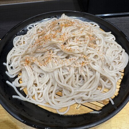 Top your large portion of soba with plenty of ichimi chilli flakes, and add plenty of chopped spring onions to the soba dipping sauce!
