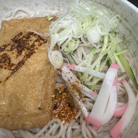 Finish off the seasoning with chopped spring onions and shichimi chilli powder