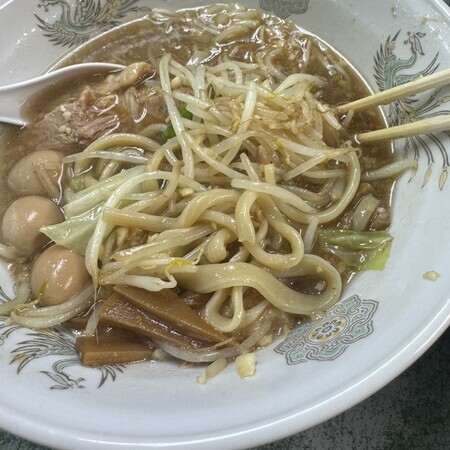 Take a suitable amount of the stiff noodles with your chopstick and drop them into the broth