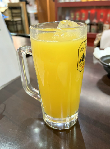 東京都足立区千住3丁目にある居酒屋「創作和食 粋心亭」オレンジジュース