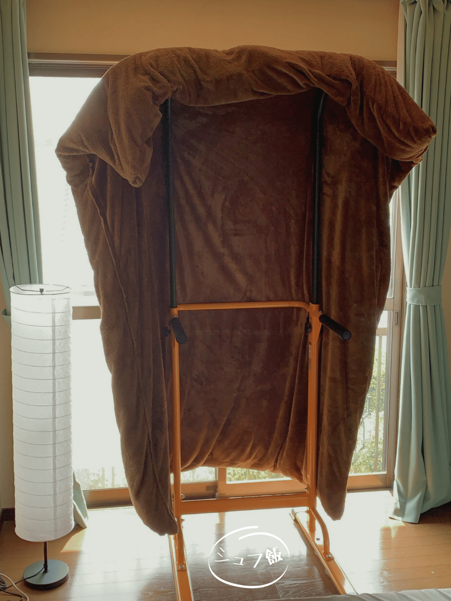 懸垂マシンで布団干し