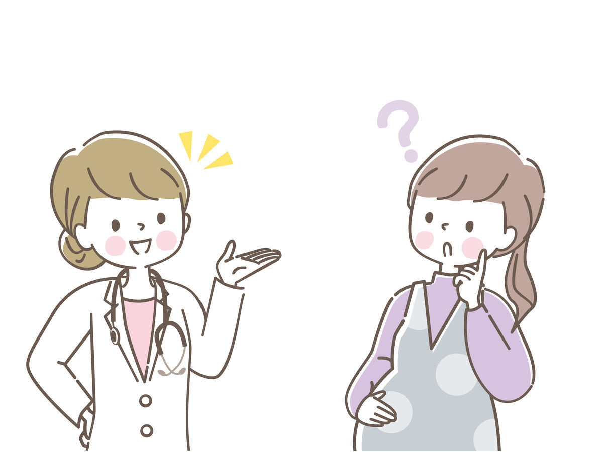 産婦人科の女医さんに相談する妊婦さん