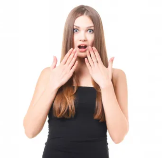 衝撃の事実に目を丸くする女性