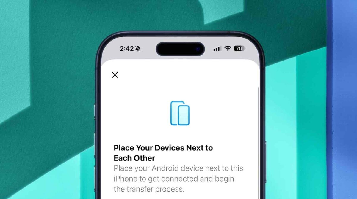 iOS 26.3のAndroid移行機能の画面。iPhoneの画面に『端末同士を近づけて転送を開始』と案内が表示されている