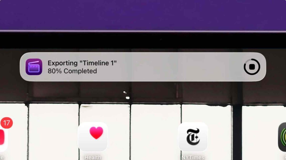 iPadの画面上部に表示されたFinal Cut Proのライブアクティビティ通知。動画書き出し中で「Exporting “Timeline 1” 80% Completed」と進捗が表示されている様子