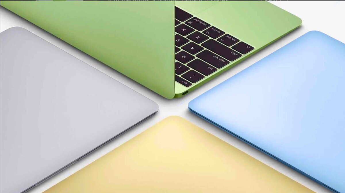 ライム、シルバー、イエロー、ブルーの4色展開で並べられたMacBookの天板と、キーボード面の一部