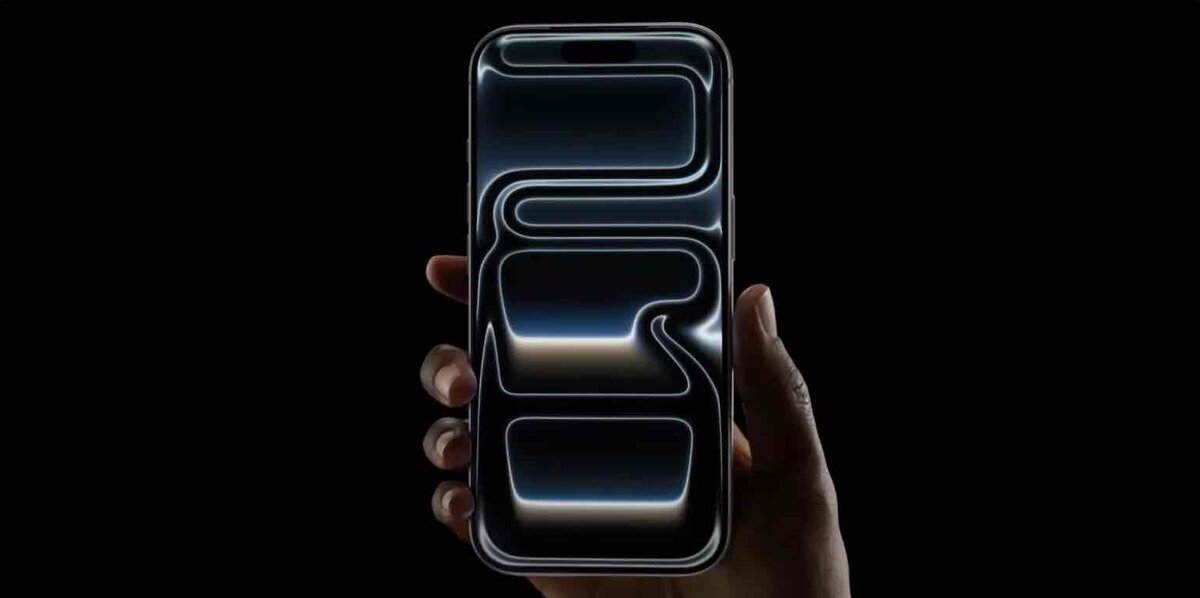 iPhone 18標準モデルの12GB RAM搭載やA20チップ採用の噂を象徴する、黒背景で手に持たれたDynamic Island搭載iPhoneのイメージ画像