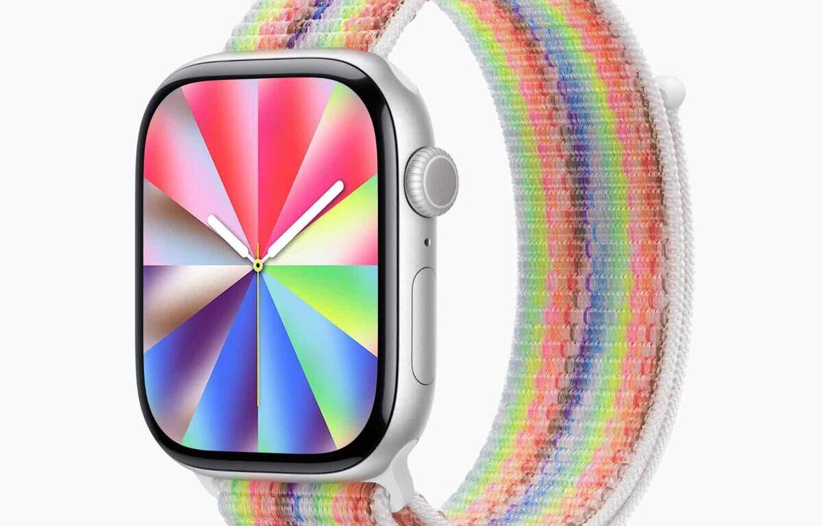 プライドルミナンス文字盤を表示したApple Watchと、虹色のプライドエディションスポーツループを組み合わせた製品画像