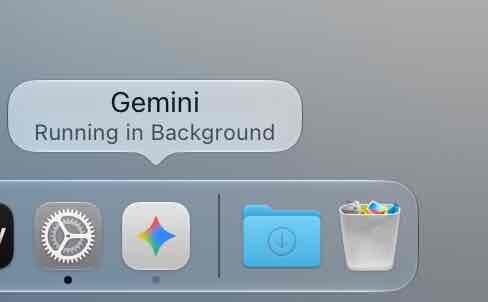 MacのDockでGeminiアイコンに「Gemini／Running in Background」のツールチップが表示され、アイコン下に灰色の点が付いている様子