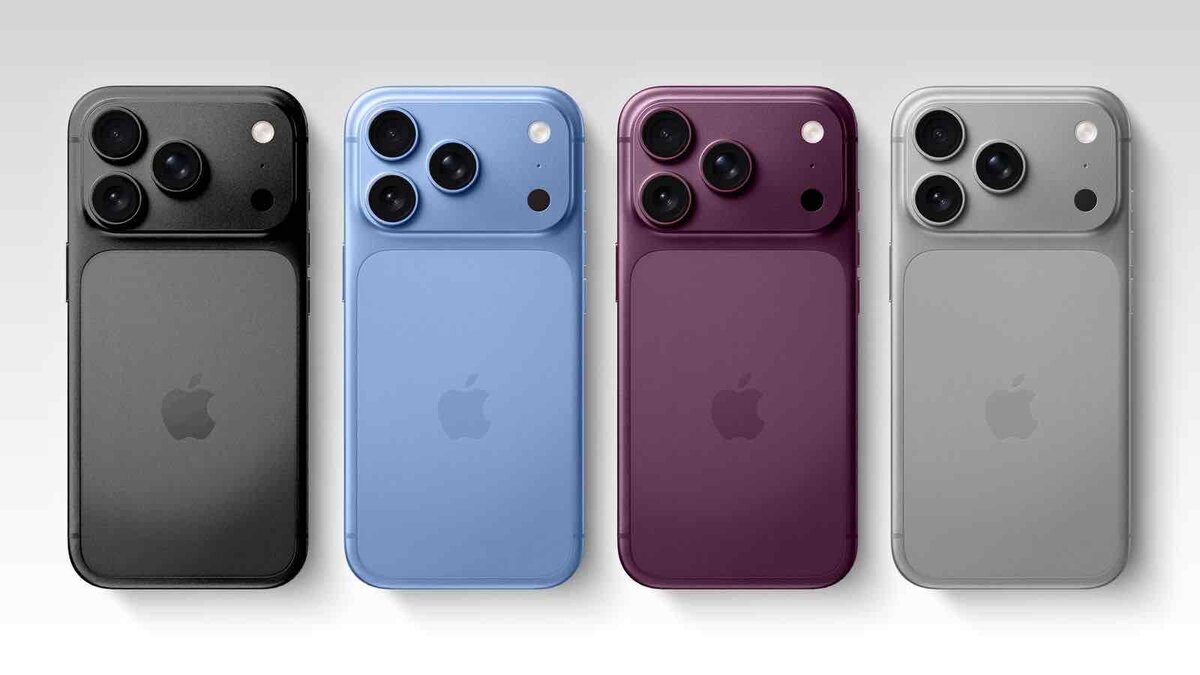 iPhone Proの背面を4台横並びにしたレンダリング画像。左から黒に近いダークグレー、ライトブルー、ワインのような深い赤、シルバーで、各機の上部には横長に張り出した三眼カメラ部があり、中央にAppleロゴが見える