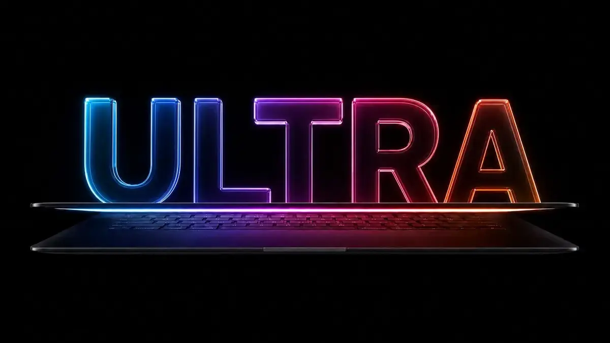 黒い背景に虹色に発光する「ULTRA」の立体文字。その下でほぼ閉じた薄型ノートパソコンのキーボードが同じ色で照らされている