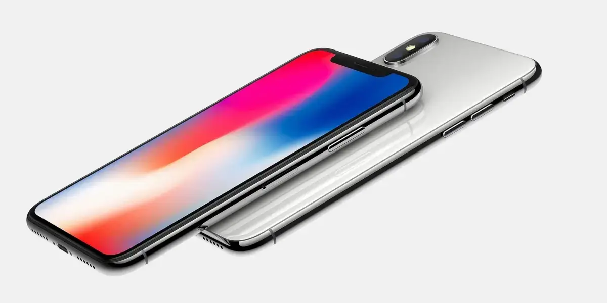 シルバーのiPhone Xが表と裏で並び、前面上部にノッチ、背面に縦2眼カメラがある
