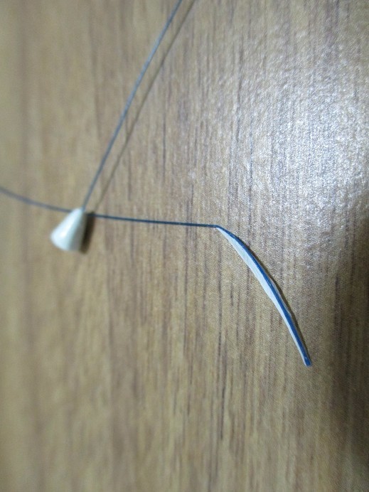 糸外れと樹脂の破断状況を伝えた報告写真