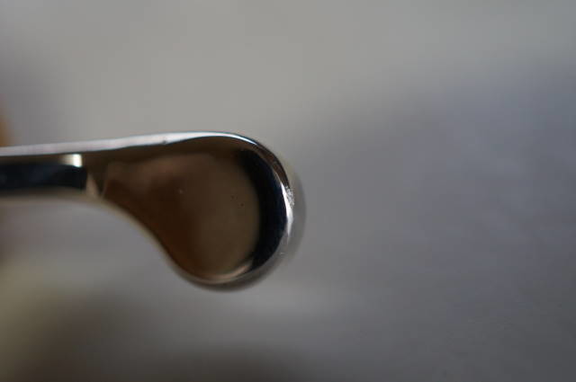 Close-up of the pure-silver chip discussed after an accidental impact.