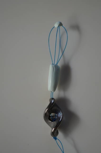 立体的な鳥かご型ループ加工を示す掲載写真