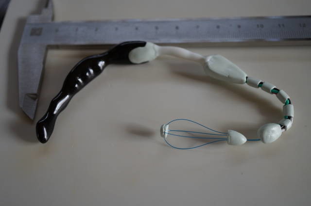 Custom assembly and broken comparison chip shown in September 2022.