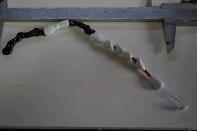The custom joined assembly pictured alongside the November report and warning.