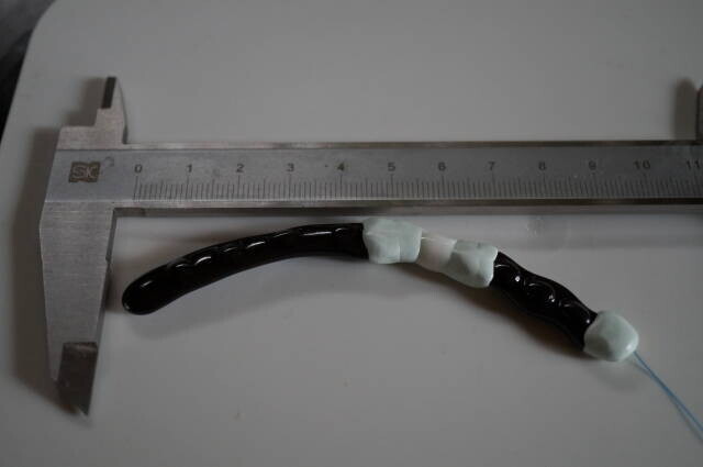 Two chips connected by rubber at a gentler angle