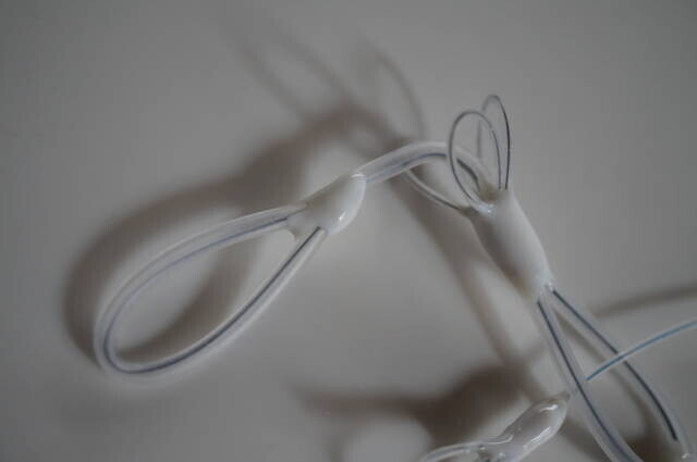 Wire petals on the stopper prototype described in April 2025