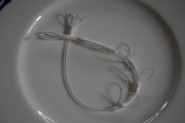 Petal-loop chipless device and the standard design with a wider urethral loop