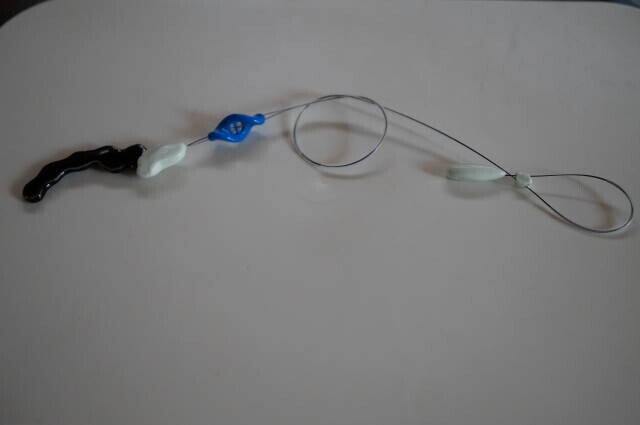 The revised wire arrangement includes exposed sections and separate short tube covers.