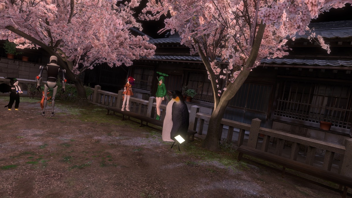 VRChat「SAKURA hiroba-yoru」で戯れるアバターたち VRChat「SAKURA hiroba-yoru」で戯れるアバターたち