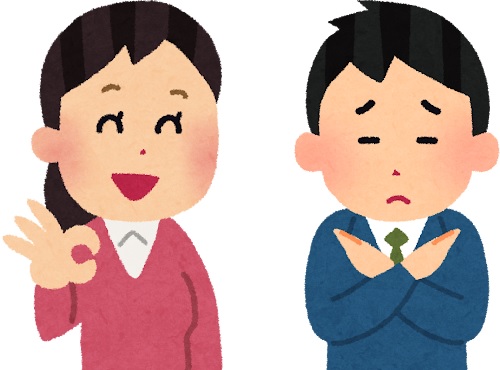 OKサインを出している女性とNGサインを出している男性