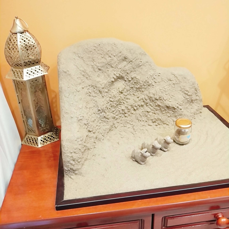 鳥取砂丘の近くにあるTotto PURINという砂プリンを販売しているお店のらくだの置物が置かれたフォトスポット