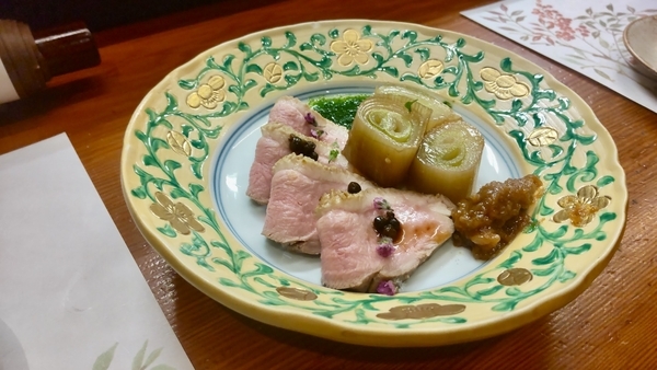 かものローストとネギの写真