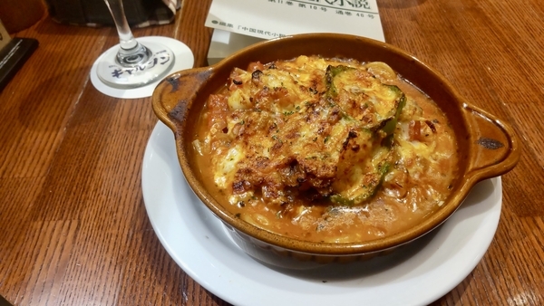 ペスカトーレにチーズをかけて焼いたものを撮った写真